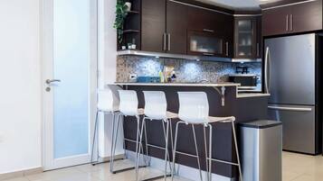 Fridge, microwave, coffee/tea maker, toaster