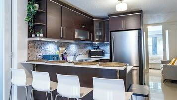 Fridge, microwave, coffee/tea maker, toaster