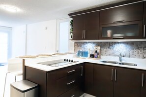 Fridge, microwave, coffee/tea maker, toaster