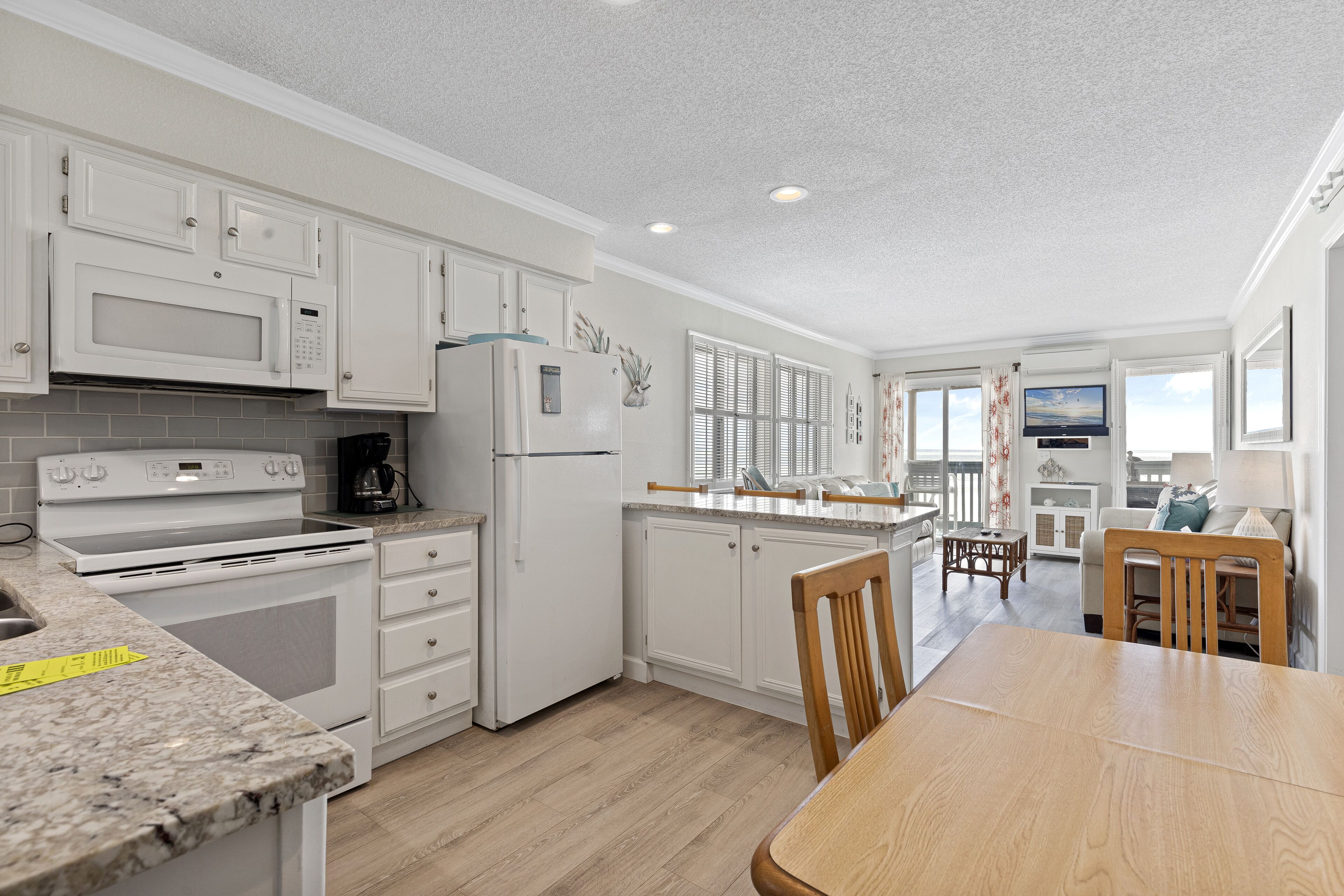 Oceanfront condo with pool, patio, central AC, & free WiFi