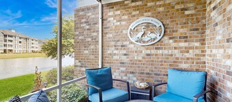 Dual-suite Magnolia Pointe condo with golf, pools, and screened patio