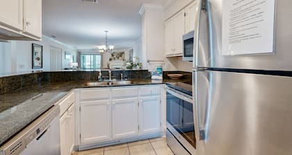 Elegant riverfront condo with access to private W/D, central AC, and pool access