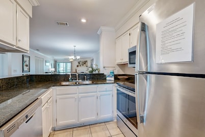 Elegant riverfront condo with access to private W/D, central AC, and pool access