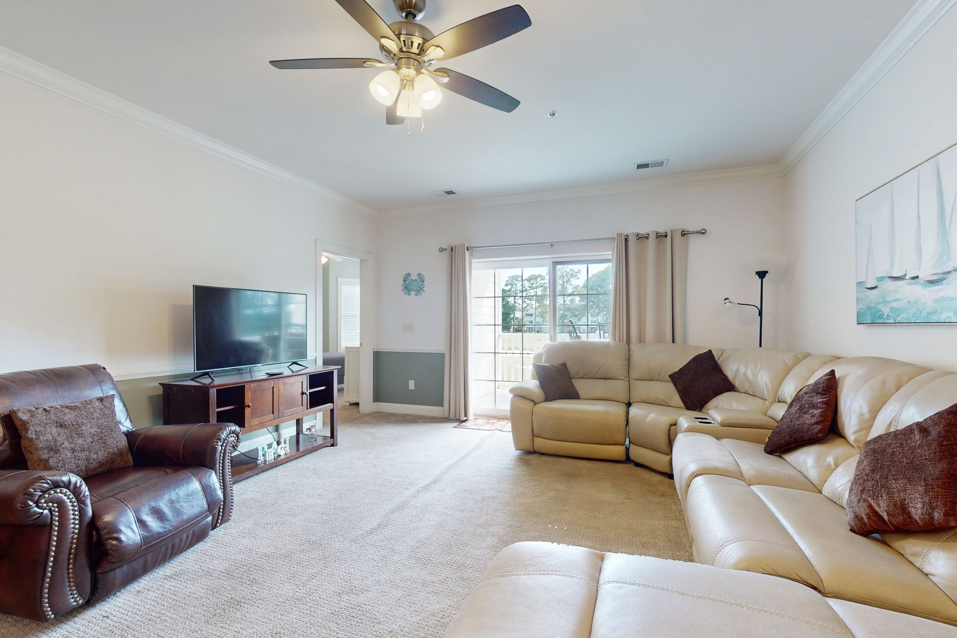 Coastal Charmer | Balcony, On-Site Pool | Short Drive to Beach