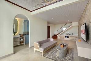 Suite Room | Living area | 50-inch LED TV with digital channels, Netflix, streaming services