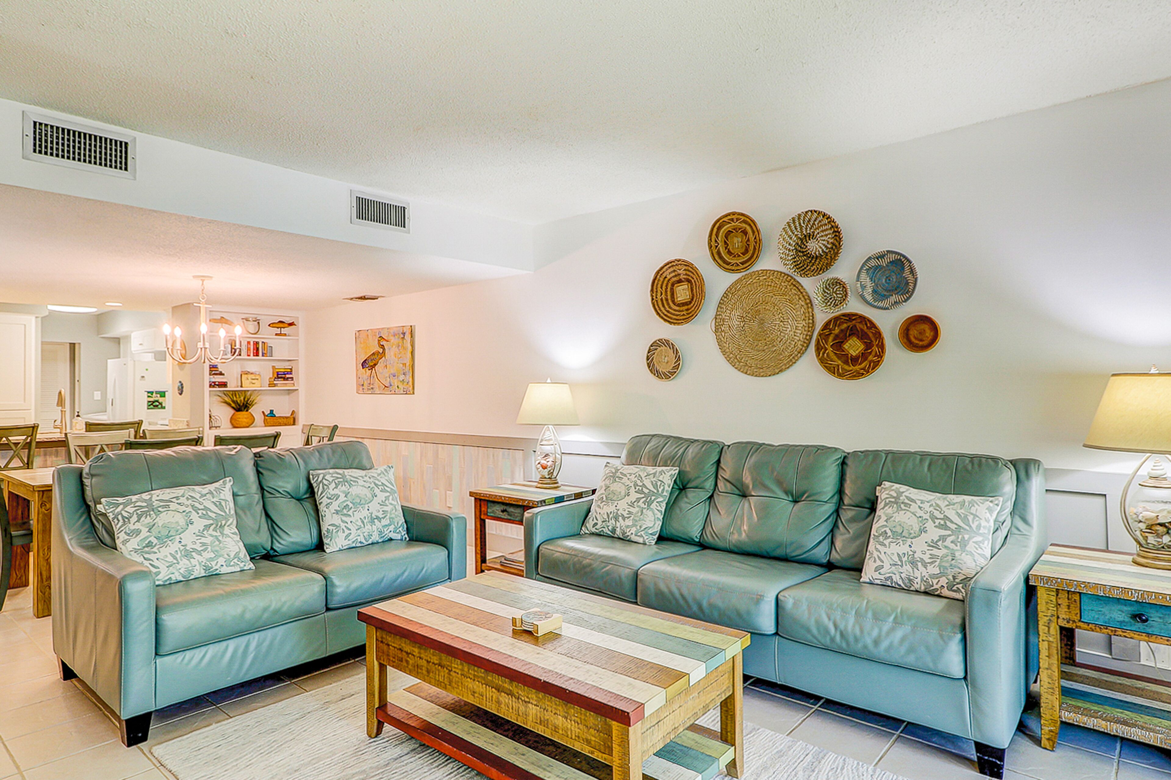 Updated beachside condo at Ocean One with 2 balconies & pool, grill, & courtyard