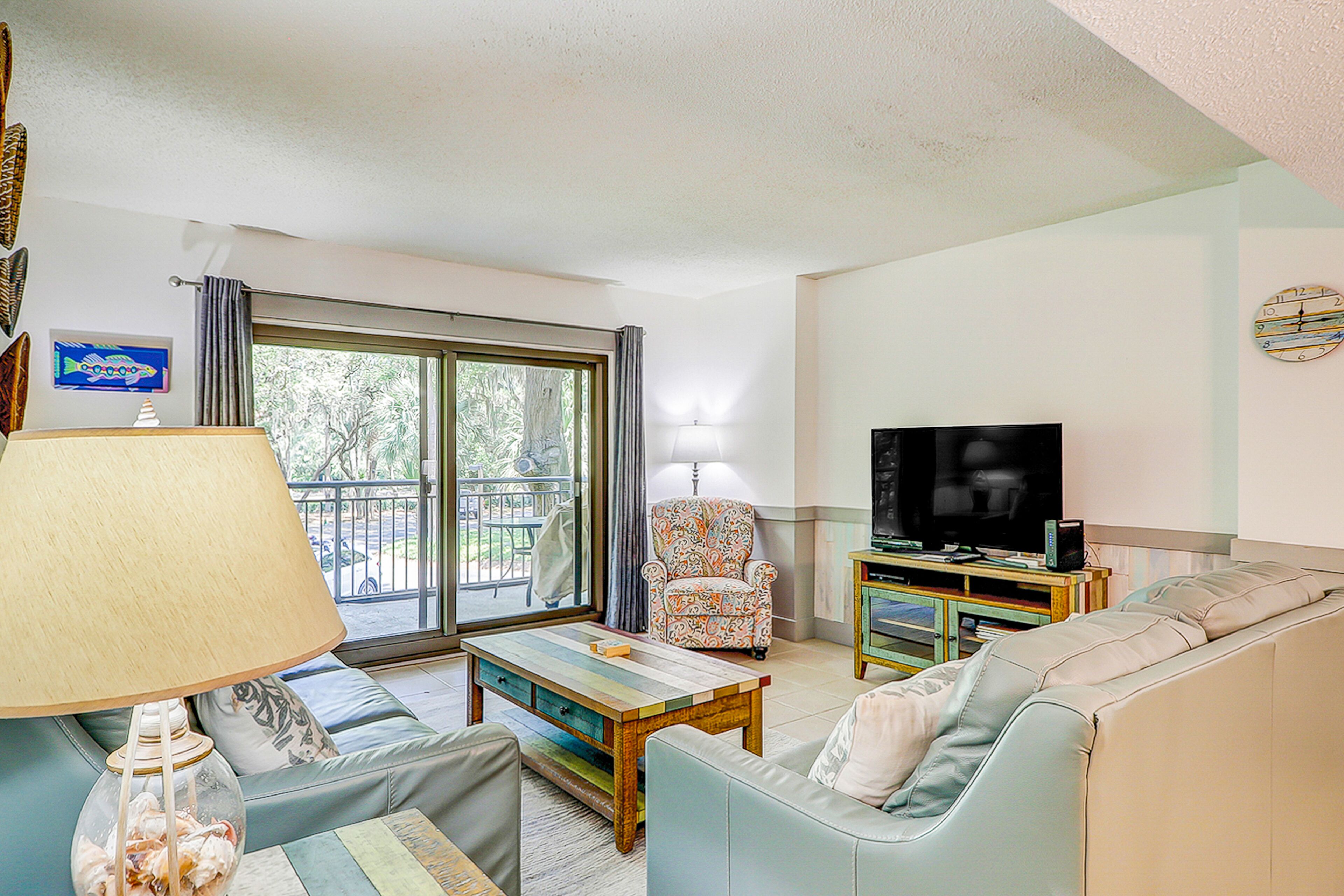 Updated beachside condo at Ocean One with 2 balconies & pool, grill, & courtyard