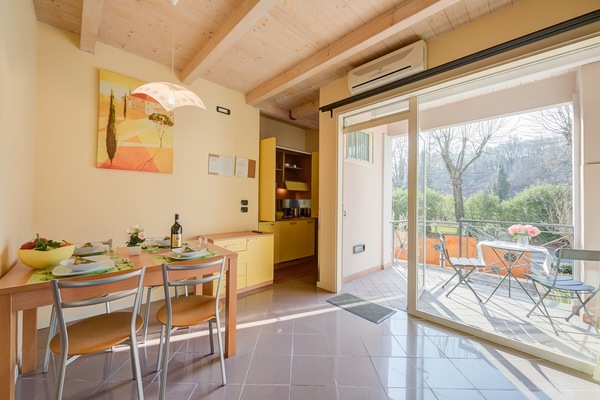 Living room with dining table and kitchenette