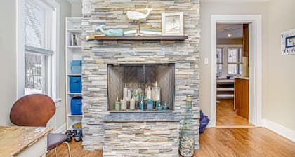 Charming cottage with fast WiFi, fire pit, above-ground pool, & huge sunroom
