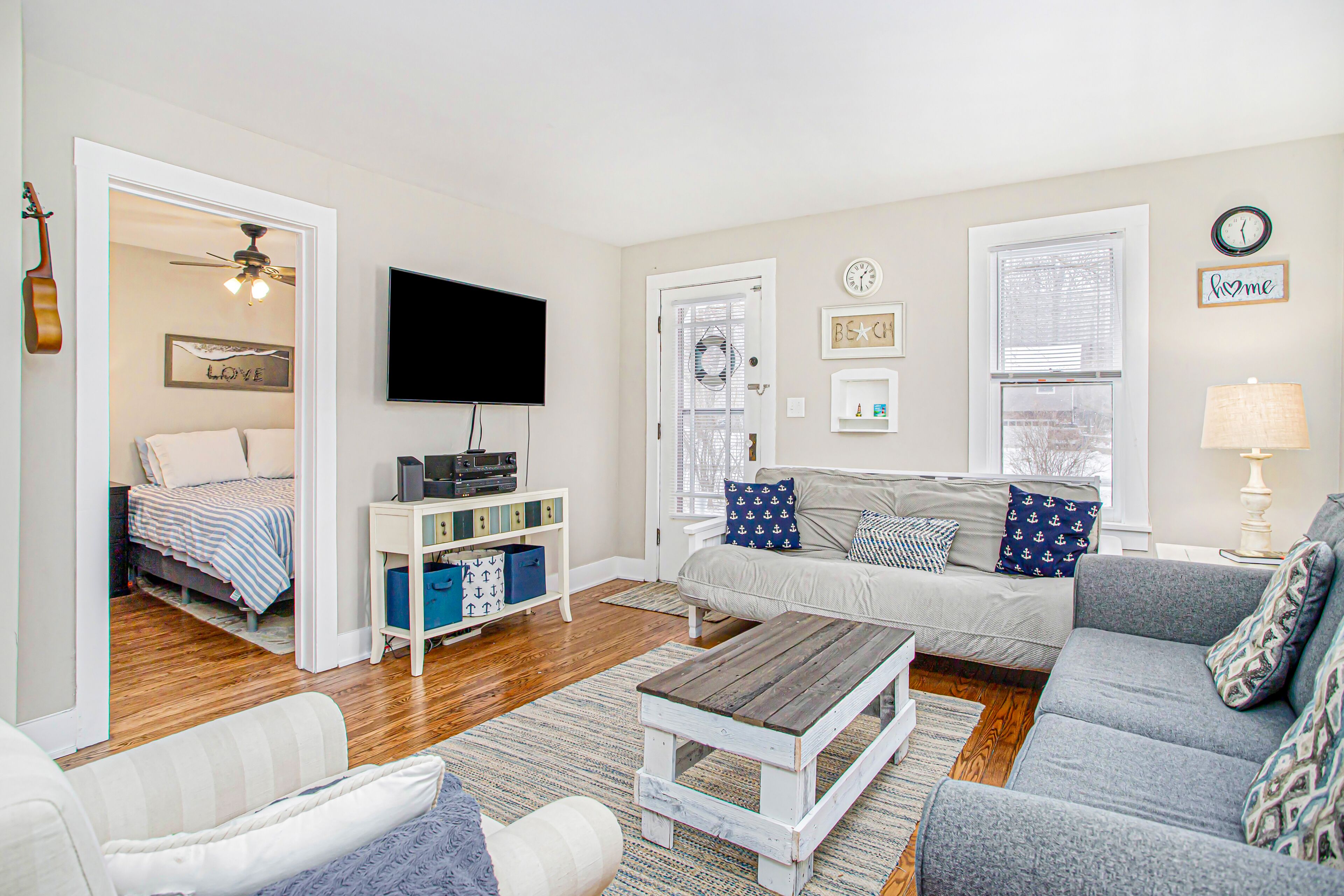 Charming cottage with fast WiFi, fire pit, above-ground pool, & huge sunroom