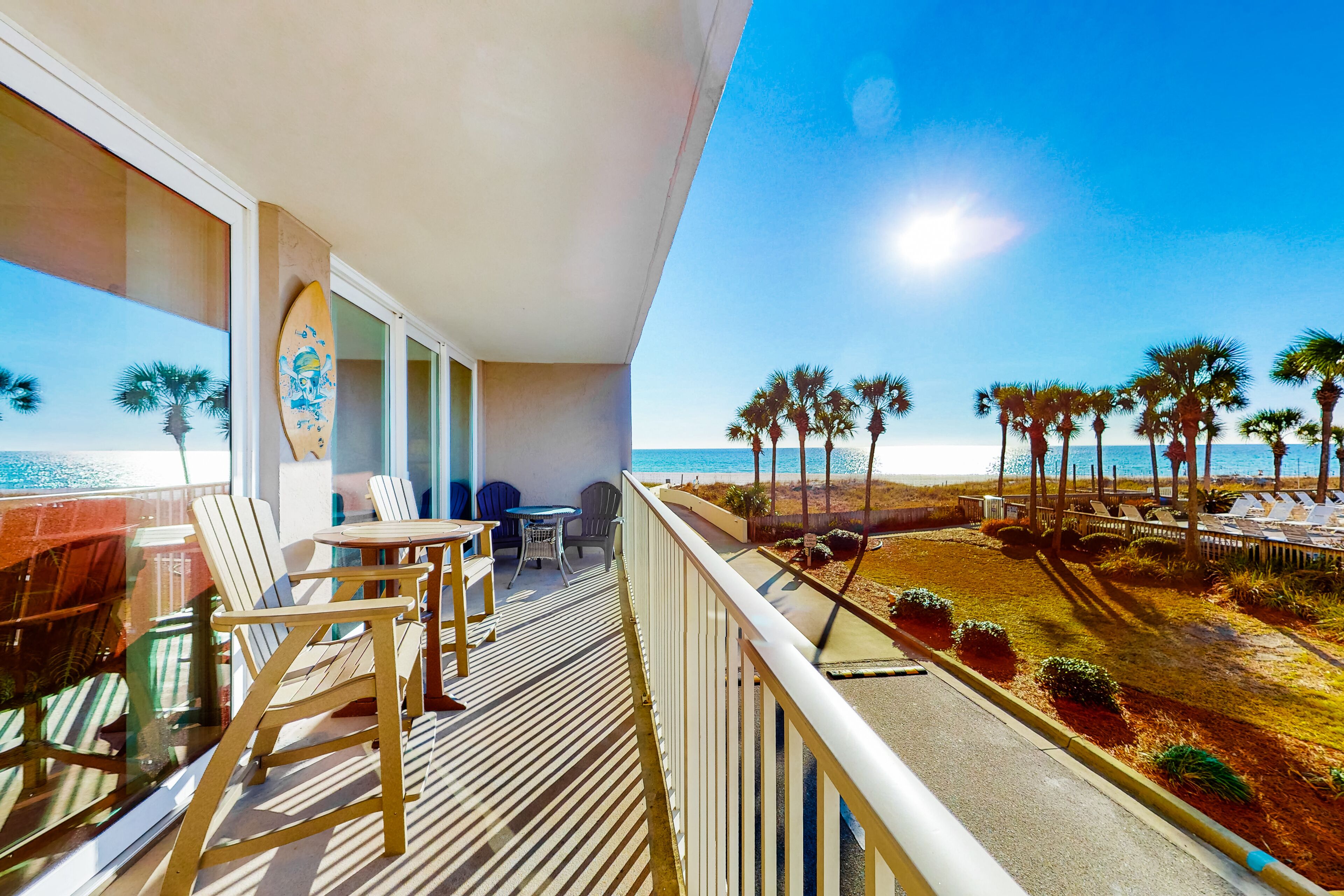 Sunset-view snowbird escape with 3 pools, gym & 1,500 feet of private beachfront