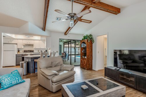 One-level home in quiet location with private pool, central AC & open layout