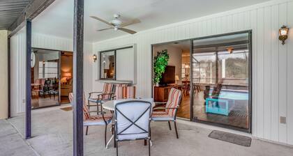 One-level home in quiet location with private pool, central AC & open layout