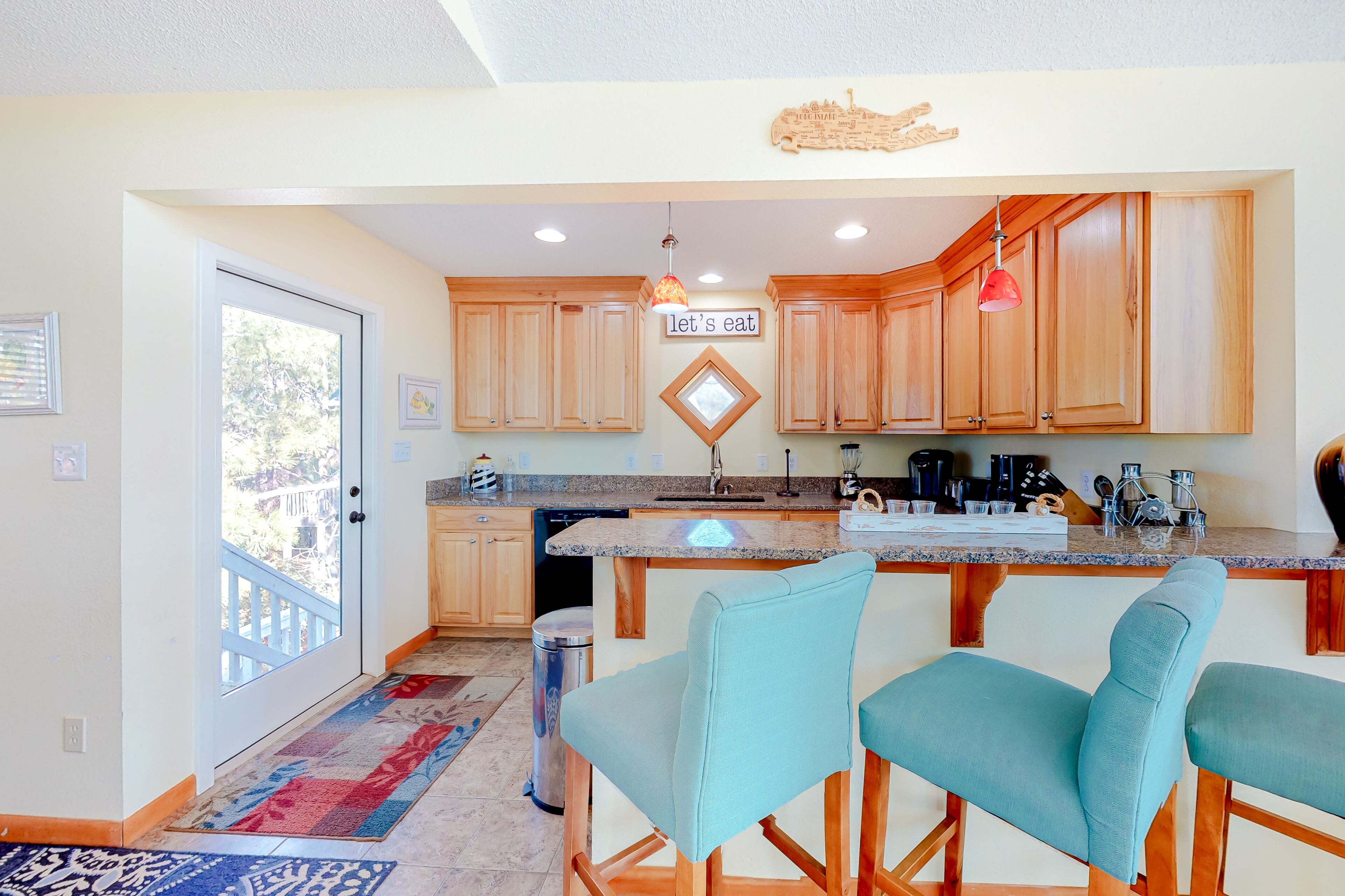 Expansive retreat with shared pool, beach access, two wraparound decks & WiFi