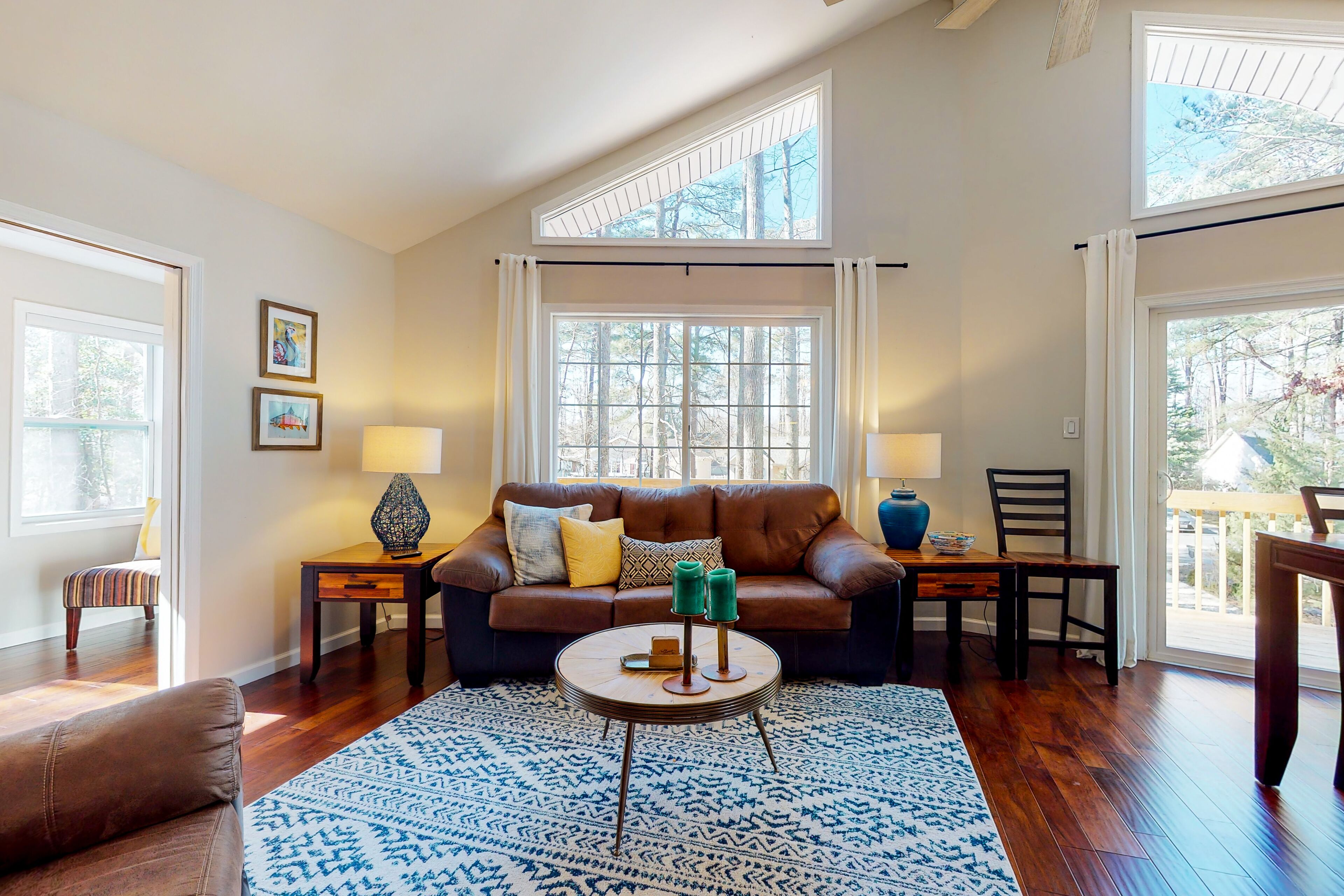 Remodeled wooded haven with firepit, yard, decks, ac, and two living areas