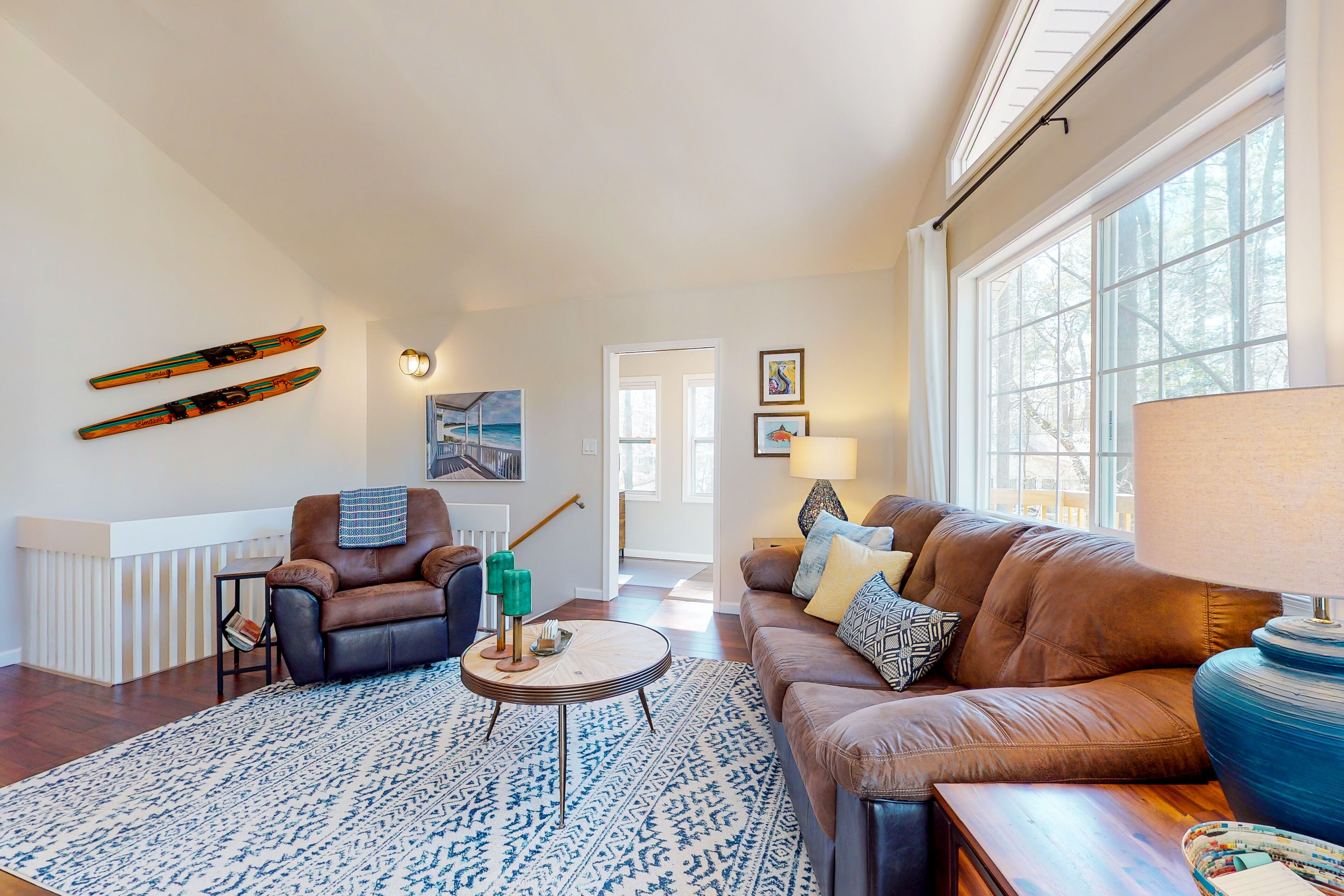 Remodeled wooded haven with firepit, yard, decks, ac, and two living areas