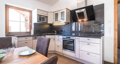 Group house at walking distance from the cosy Westendorf