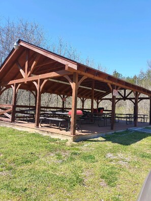 Outdoor dining - Beautiful 2 Bed Cabin with Hot Tub and Resort Pool! (Sevierville)