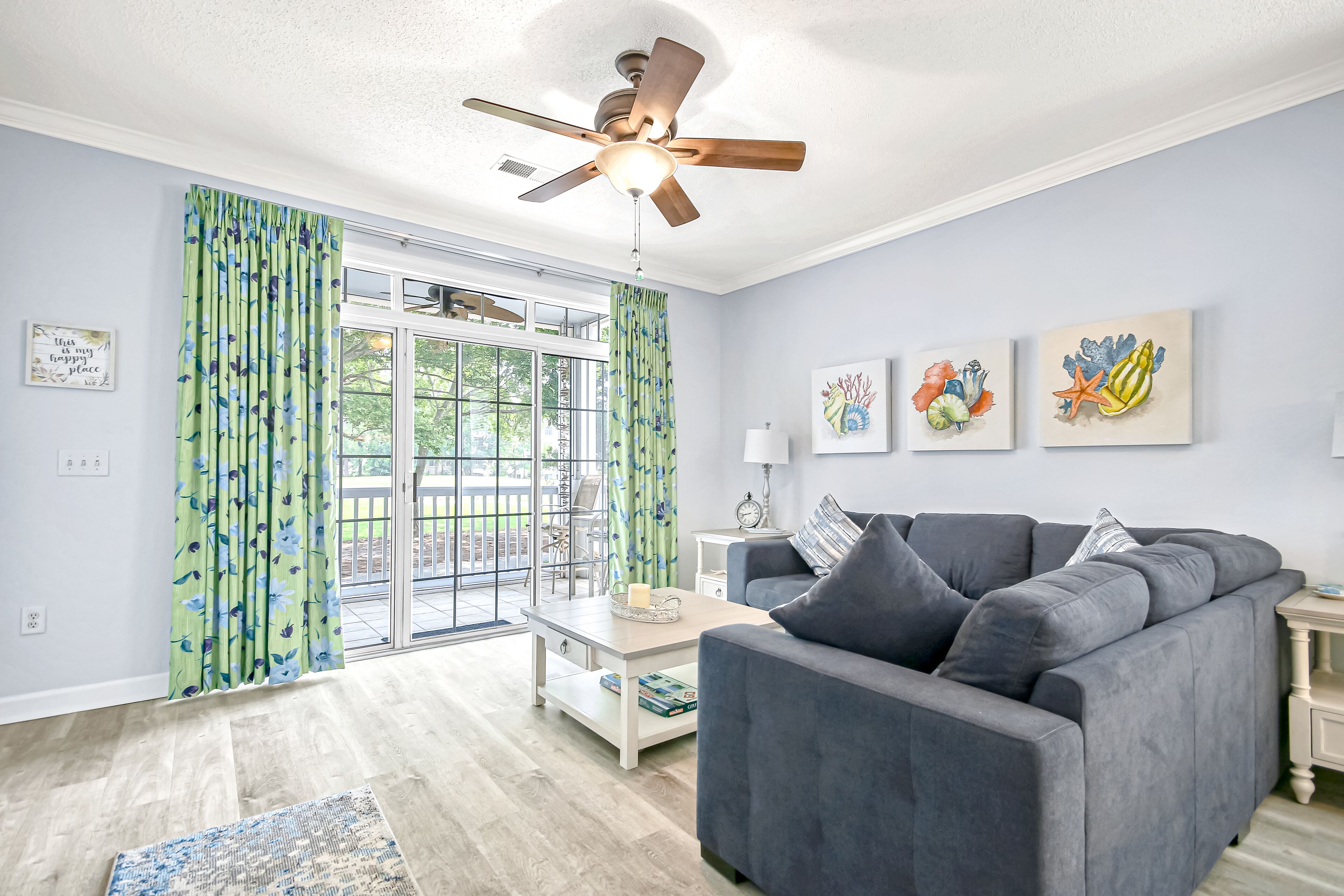 Resort home with screened balcony, two pools, four golf courses, & beach shuttle