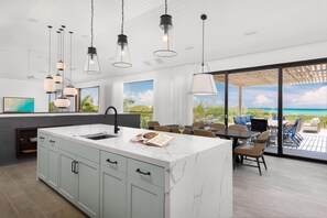 Fridge, microwave, oven, stovetop - Aqua Verde Villa Turks & Caicos – Private 3-Bedroom Grace Bay Beach Villa Rental (Providenciales)