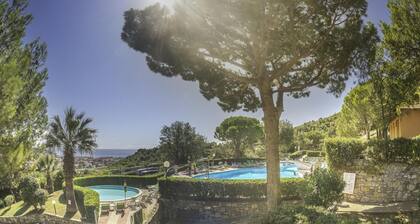 Nouvelle gestion Maison de Vacances Villaggio Colombo V6 avec terrasse et piscine partagée