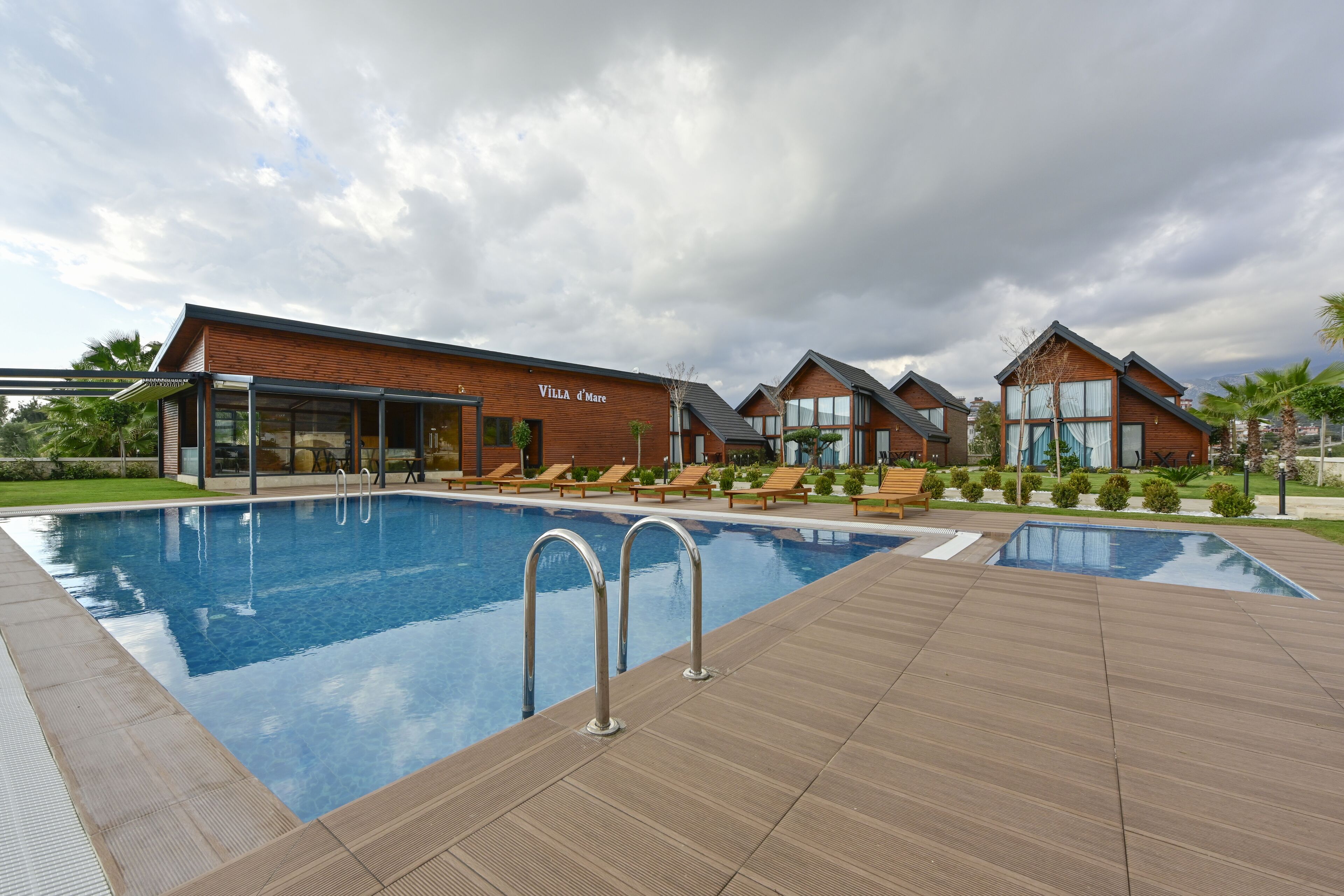 Outdoor pool, pool umbrellas, pool loungers