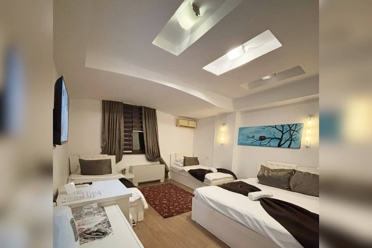 Comfort Quadruple Room | 1 bedroom, premium bedding, desk, laptop workspace