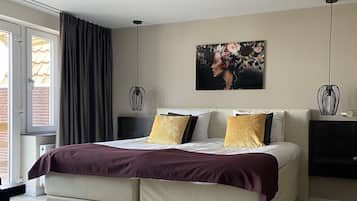 Deluxe Suite, Terrace | 2 bedrooms, memory foam beds, in-room safe, blackout drapes