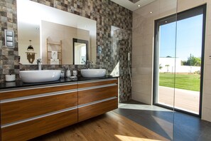 Bathtub, hair dryer, towels