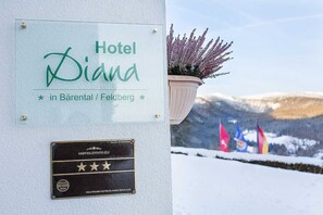 A sign for Hotel Diana in Bärental/Feldberg with a plaque indicating a 4-star rating from HOTELSTARS EU.