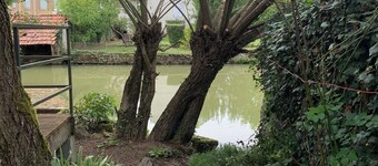 Pretty little house on the river Aron