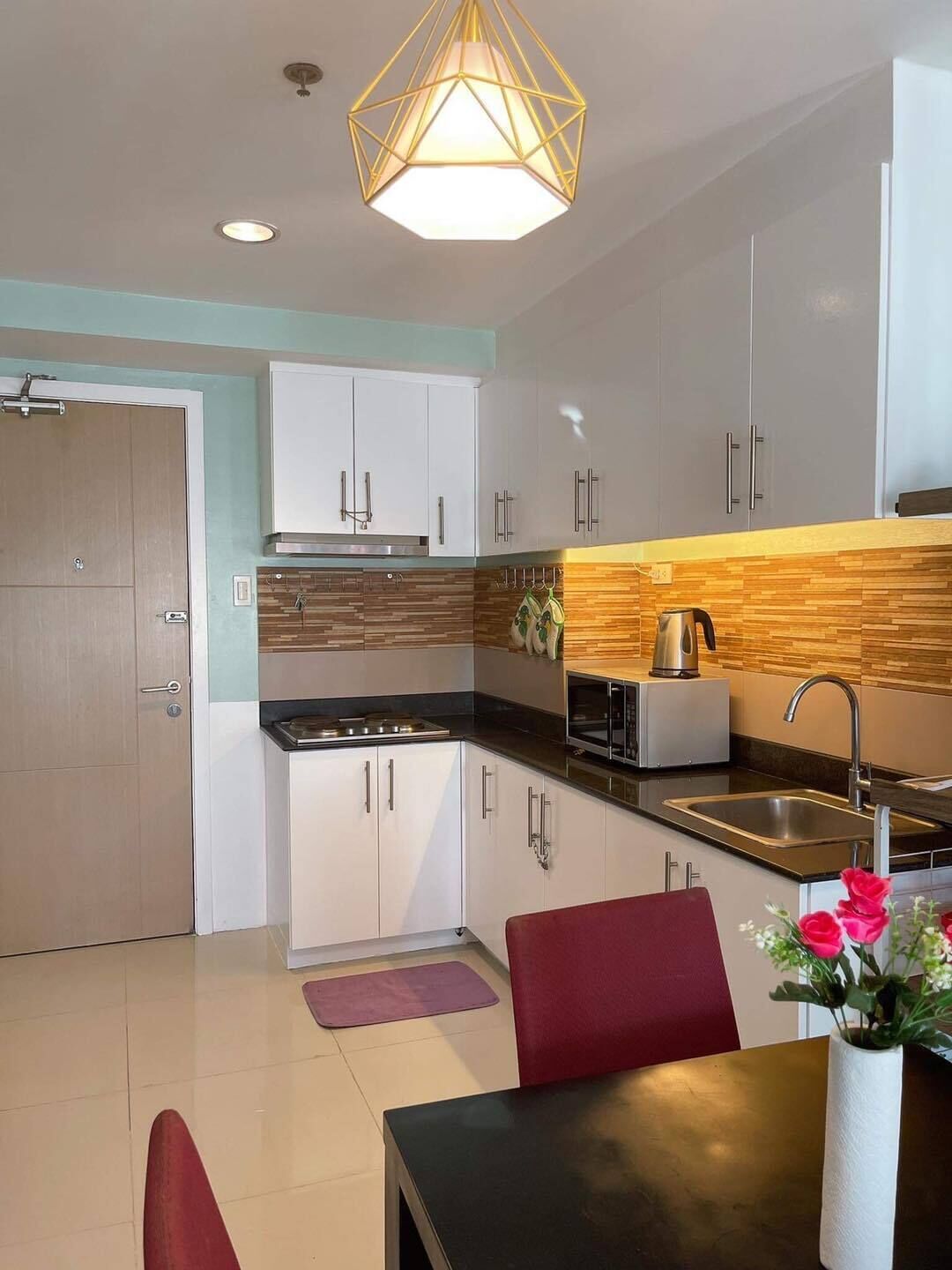 Fridge, microwave, electric kettle, cookware/dishes/utensils