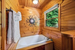 Combined shower/bathtub, hair dryer, towels, soap - Family Cabin by Dollywood 3B/2B just mins from parkway w/Hot Tub/Arcade/Billard (Pigeon Forge)