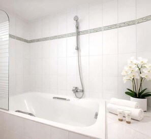 Shower, hair dryer, towels