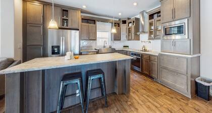 Modern, spacious home with private hot tub & W/D - great location