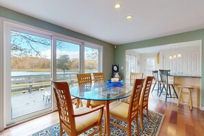 Dining - Waterfront Cape house with large deck, fireplace, modern kitchen & grassy yard (East Falmouth)
