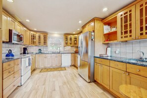 Fridge, microwave, oven, stovetop - Waterfront Cape house with large deck, fireplace, modern kitchen & grassy yard (East Falmouth)