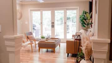 Smart TV, fireplace, books, printers