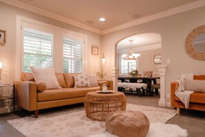 Smart TV, fireplace, books, printers