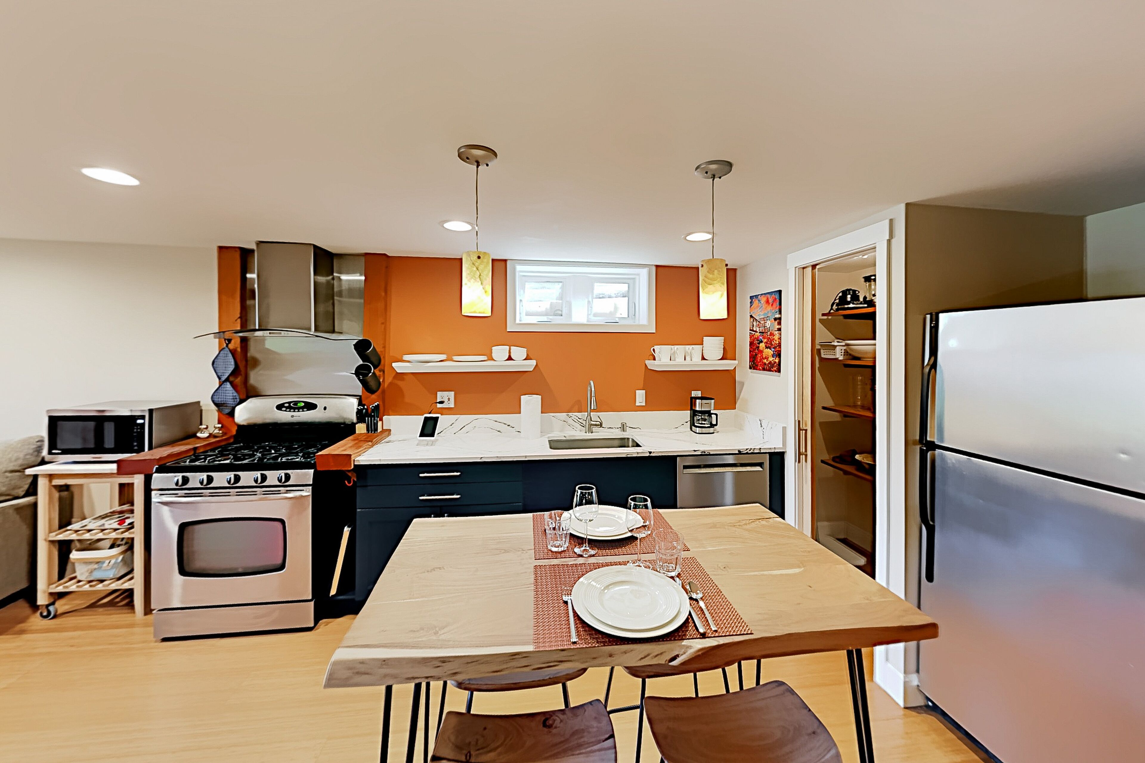 Sunlit lower-level Craftsman home with patio & garden - walkable to everything