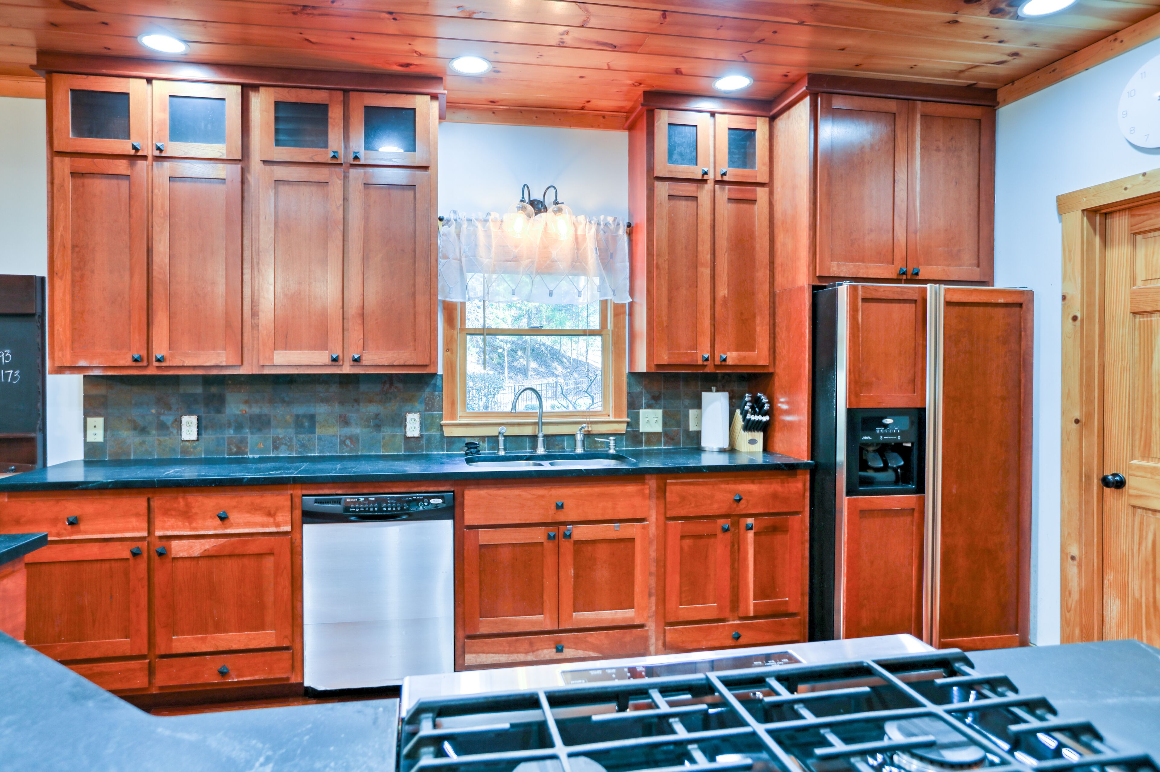 Riverfront cabin with serene views, fireplaces & game room with pool table