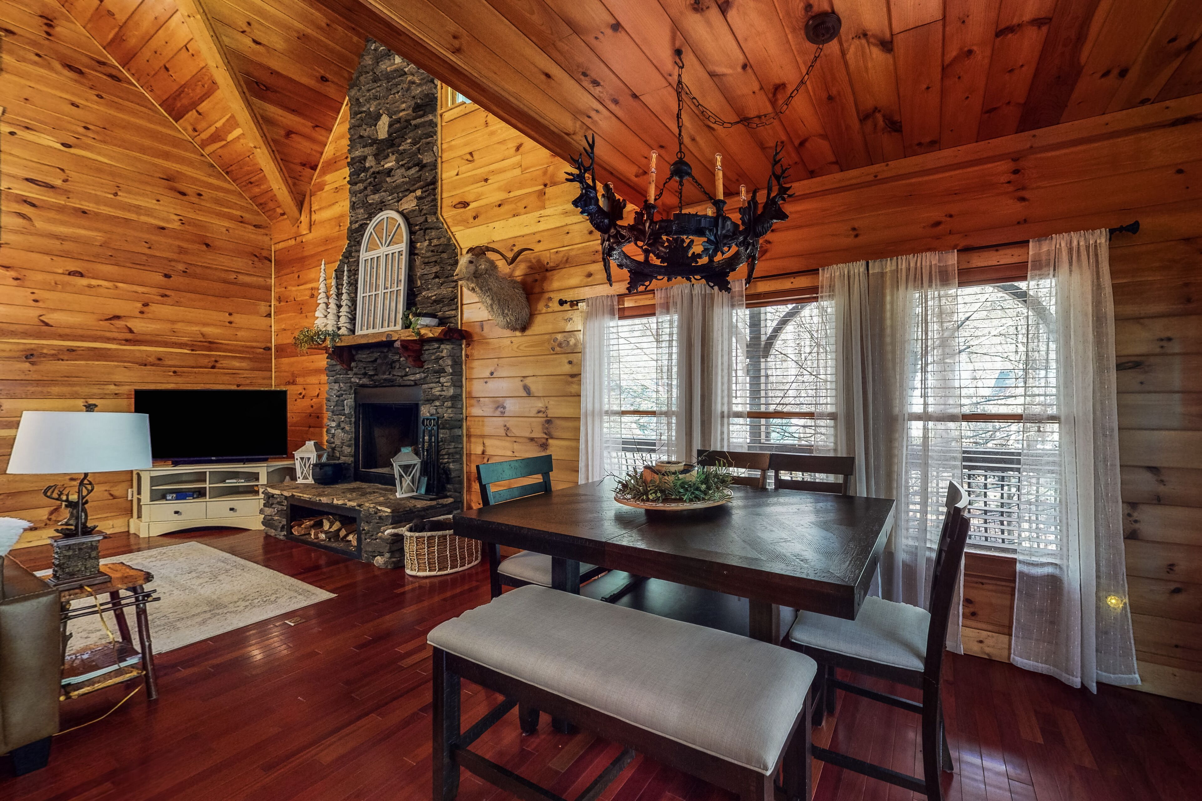 Riverfront cabin with serene views, fireplaces & game room with pool table