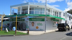 A TerryWhite Chemmart building with a sign for Peter Needs.