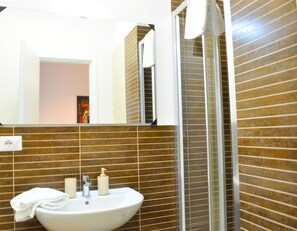 Shower, jetted tub, hair dryer, bidet