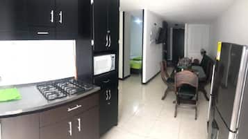 Microwave, coffee/tea maker, cookware/dishes/utensils