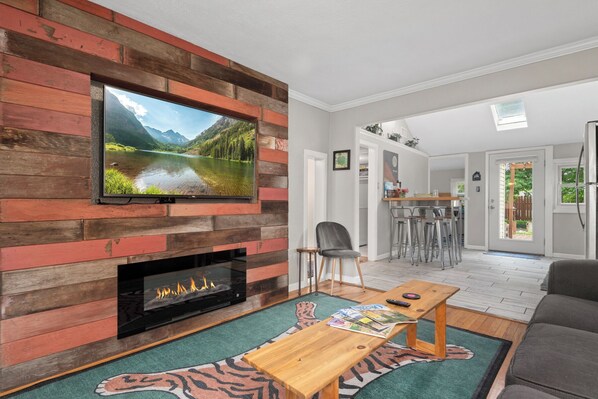 Smart TV, fireplace, books