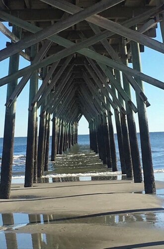 Beautiful Condo on the island of Sunset beach steps  from the beach.