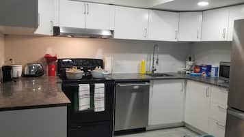 Coffee/tea maker, fridge, microwave, oven