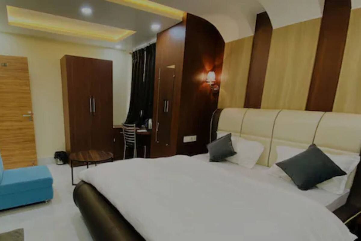 Habitación doble Deluxe, vista a la ciudad | Sábanas de algodón egipcio, ropa de cama de alta calidad y edredón