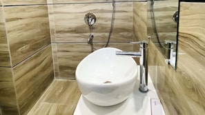 Deluxe Double Room, City View | Bathroom | Shower, rainfall showerhead, free toiletries, bathrobes
